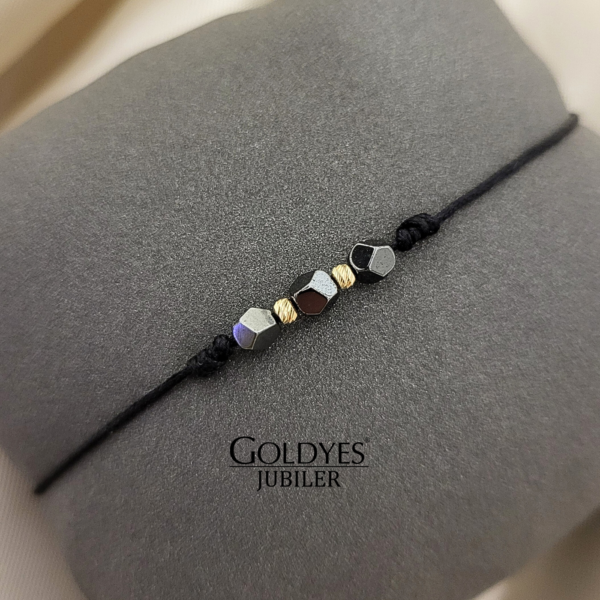 złota bransoletka na czarnym sznurku kamień hematyt próba złota 585