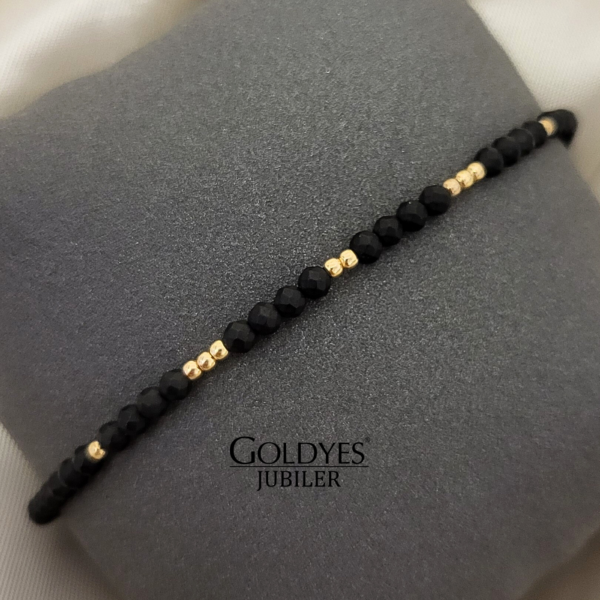 złota bransoletka męska na czarnym sznurku próba złota 585