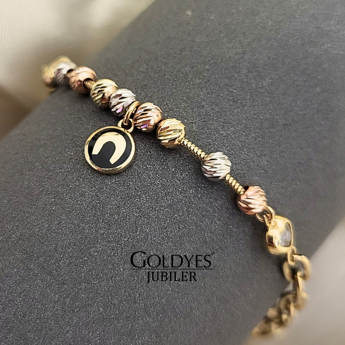 Złota bransoletka z zawieszkami próba złota 585