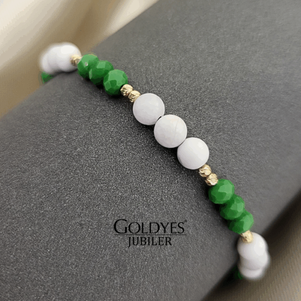 złota bransoletka na czarnym sznureczku z diamentowanymi kulkami próba złota 585