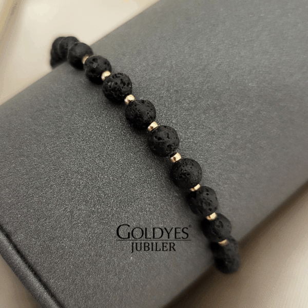 złota bransoletka na czarnym sznureczku z diamentowanymi kulkami próba złota 585