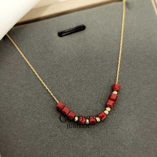 Złoty łańcuszek naszyjnik z koralem próba złota 585 14k