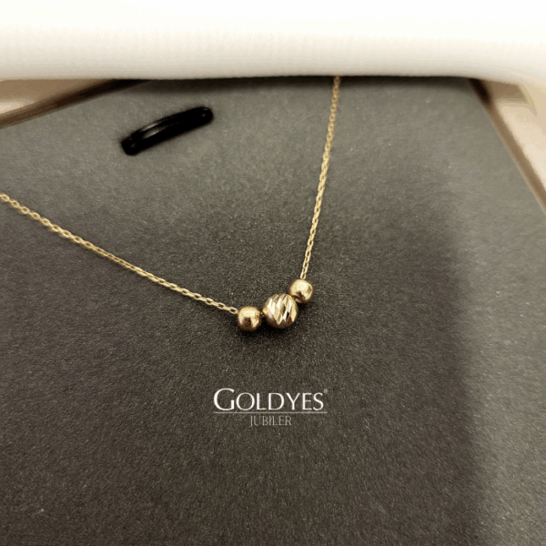 Złoty damski łańcuszek naszyjnik z diamentowanymi kulkami próby złota 585